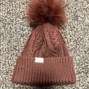 The North Face dusty plum Knit Pom-Pom Beanie.